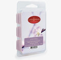 Cera di soia profumata LOVE SPELL - Fiori bianchi e dolci pesche