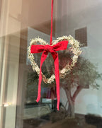 CUORE di pino innevato